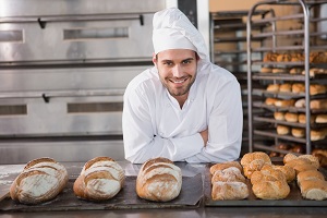 baker smiling at camera