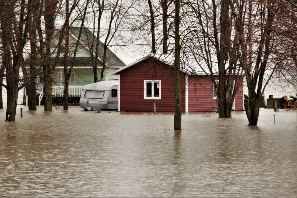 a small house in a body of water