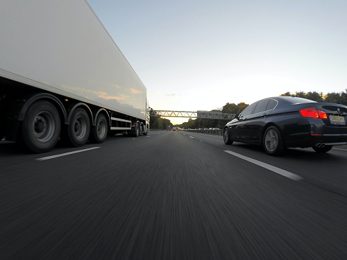 a truck is parked on the side of a road