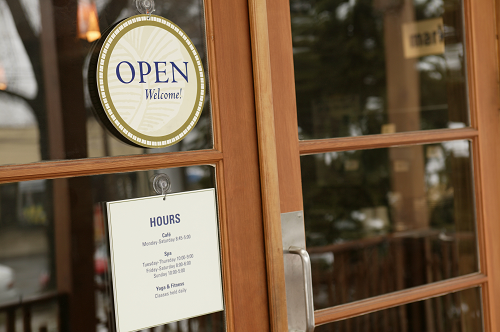 an open sign on storefront window