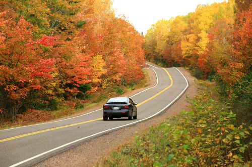 a car driving down a country road